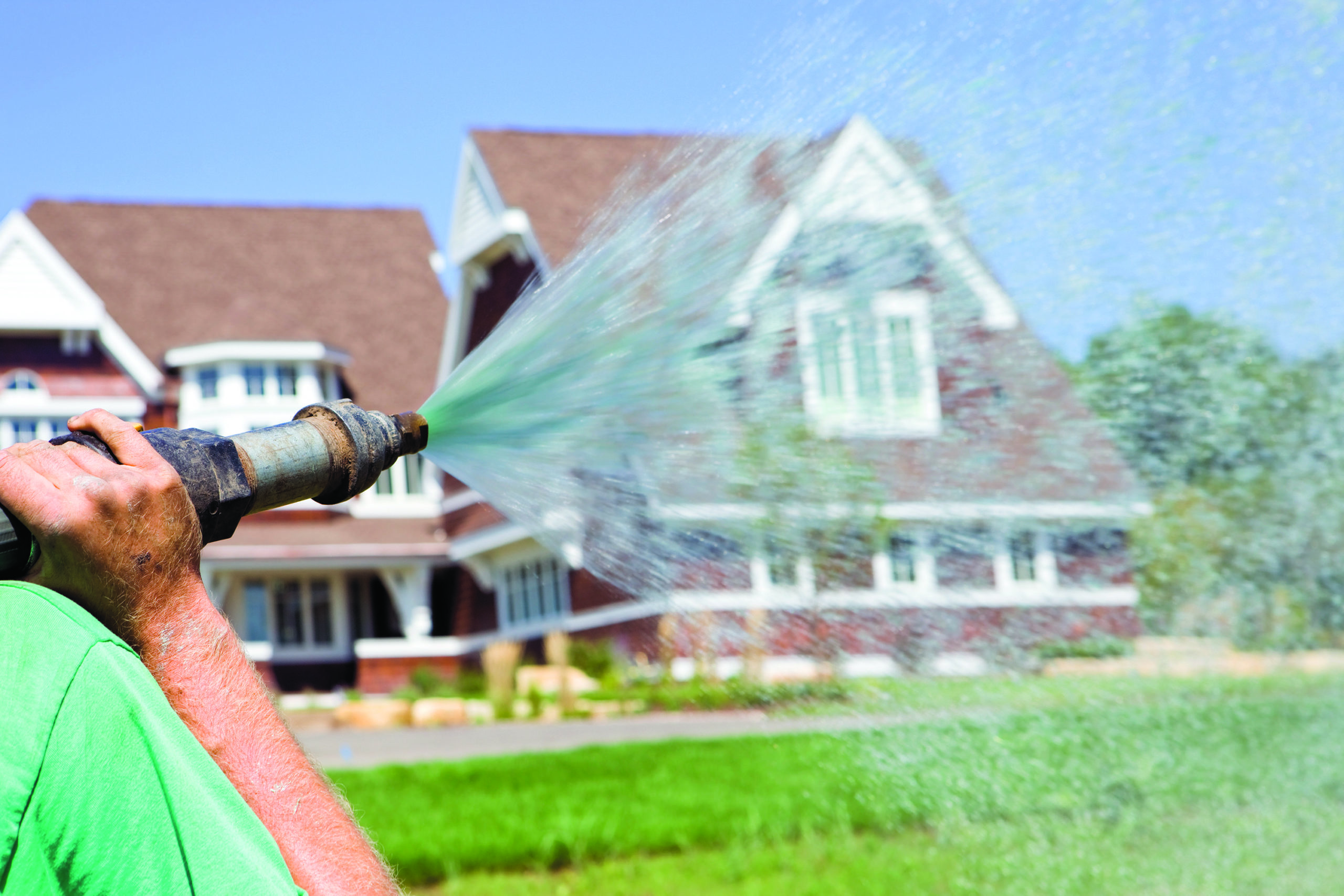 Man hydroseeding